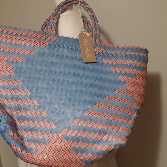 This hand woven unique pink and blue tote